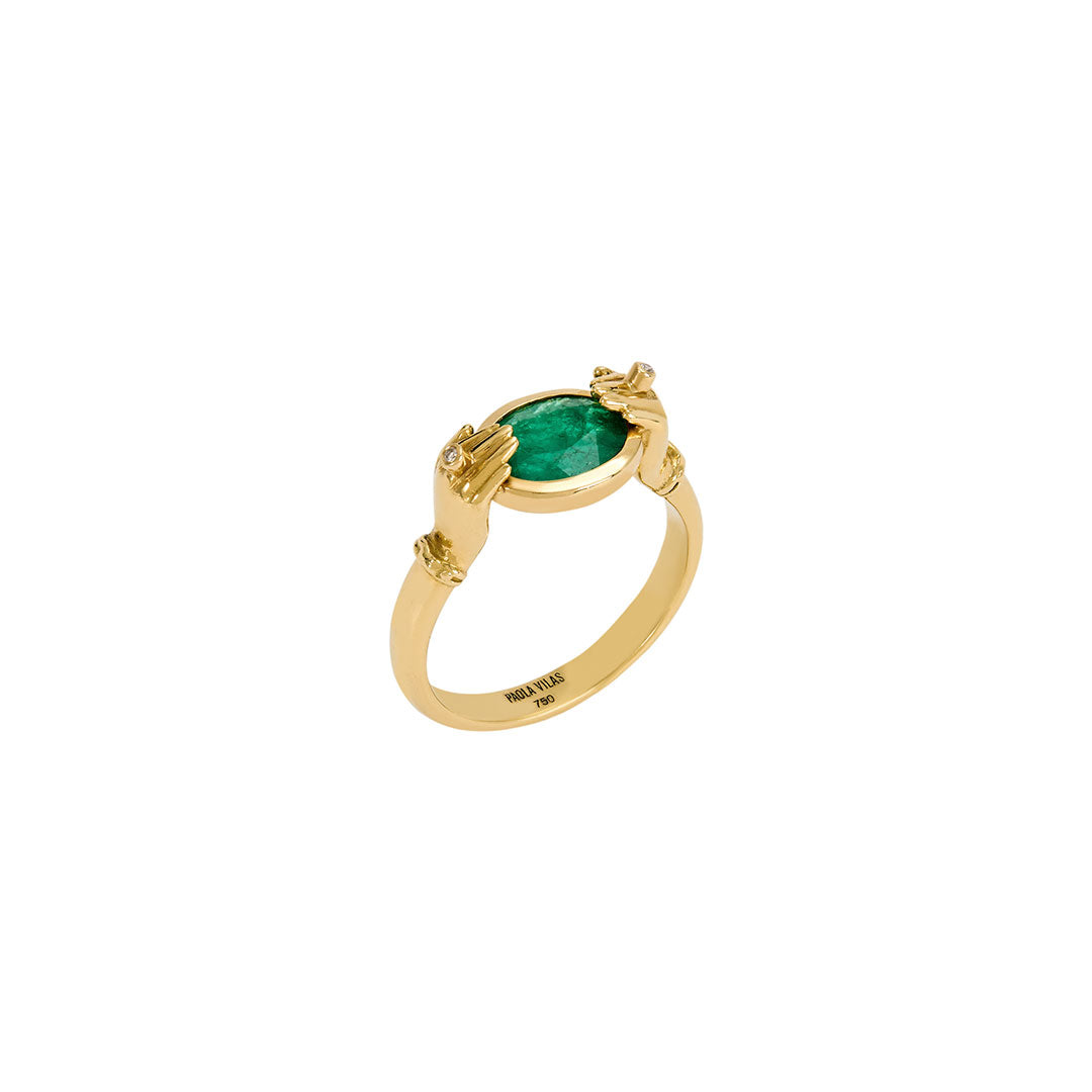 Anel Paola Vilas de mãos em ouro 18k adornadas com diamantes e esmeralda oval