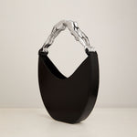 Paola-Vilas-bolsa-escultura-vestível-corpo-mulher-joias