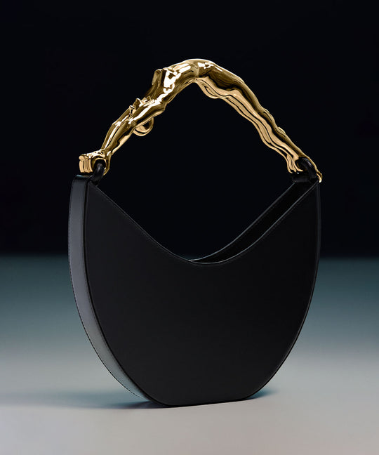 Paola Vilas bolsa escultural preta em formato de corpo feminino 