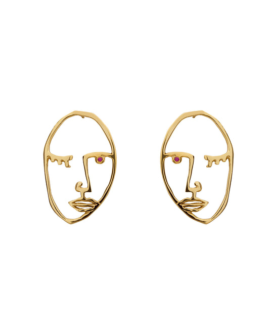 Paola Vilas Brinco Cocteau, um de nossos clássicos, disponível nas variantes Prata 925 ou Prata 925 com banho em Ouro 18k. Ambos com Rubi natural. Joias Femininas.