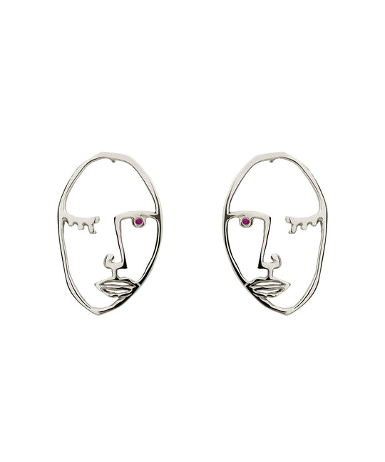 Paola Vilas Brinco Cocteau, um de nossos clássicos, disponível nas variantes Prata 925 ou Prata 925 com banho em Ouro 18k. Ambos com Rubi natural. Joias Femininas.