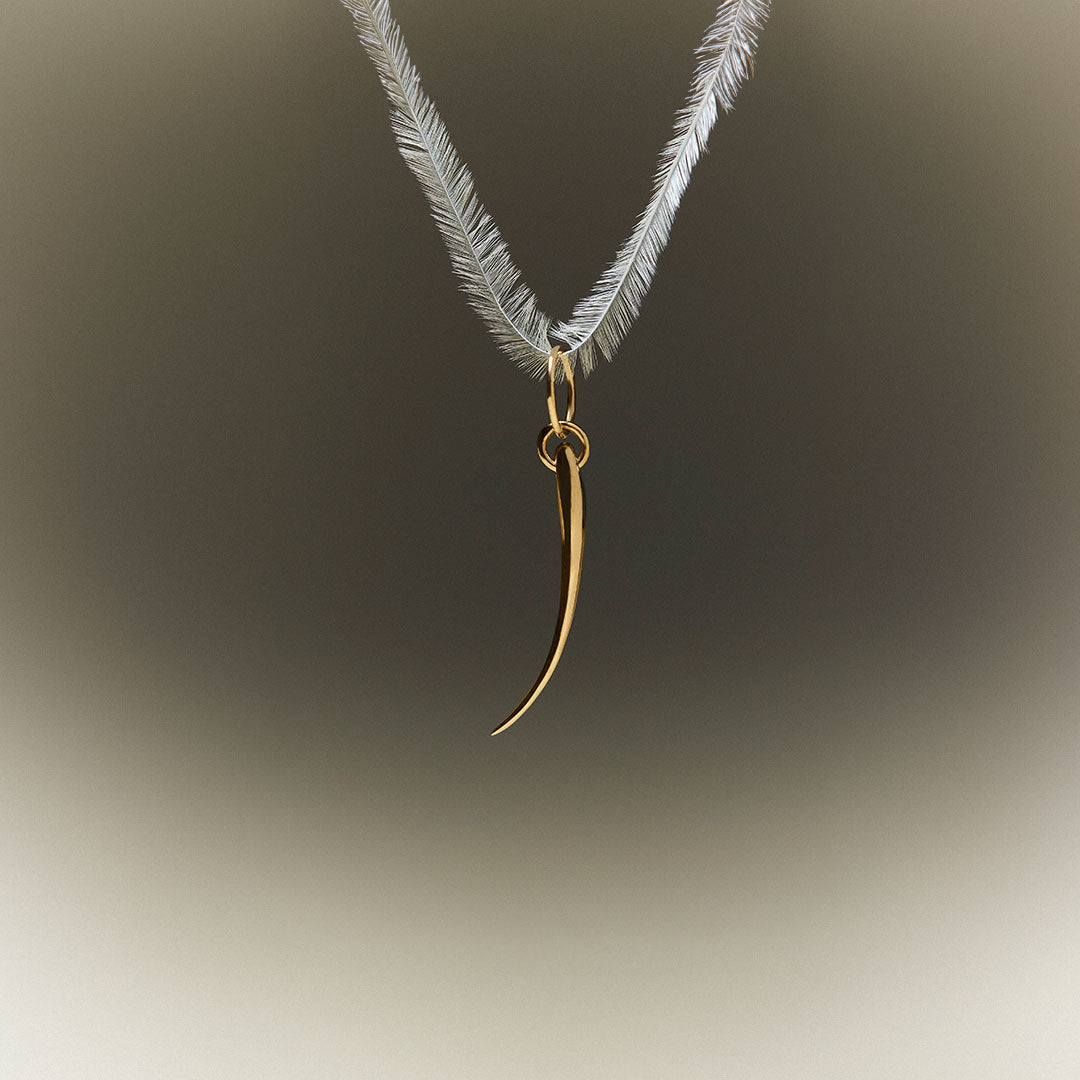 Pendente em ouro 18k de cílio