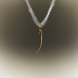 Pendente em ouro 18k de cílio